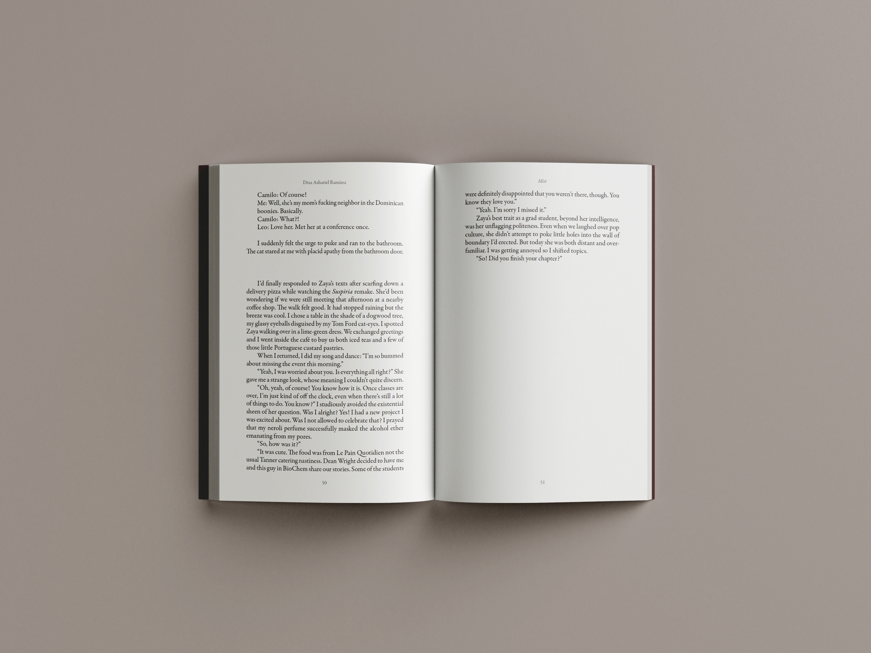 Interior spread with body text and dark chapter opening page