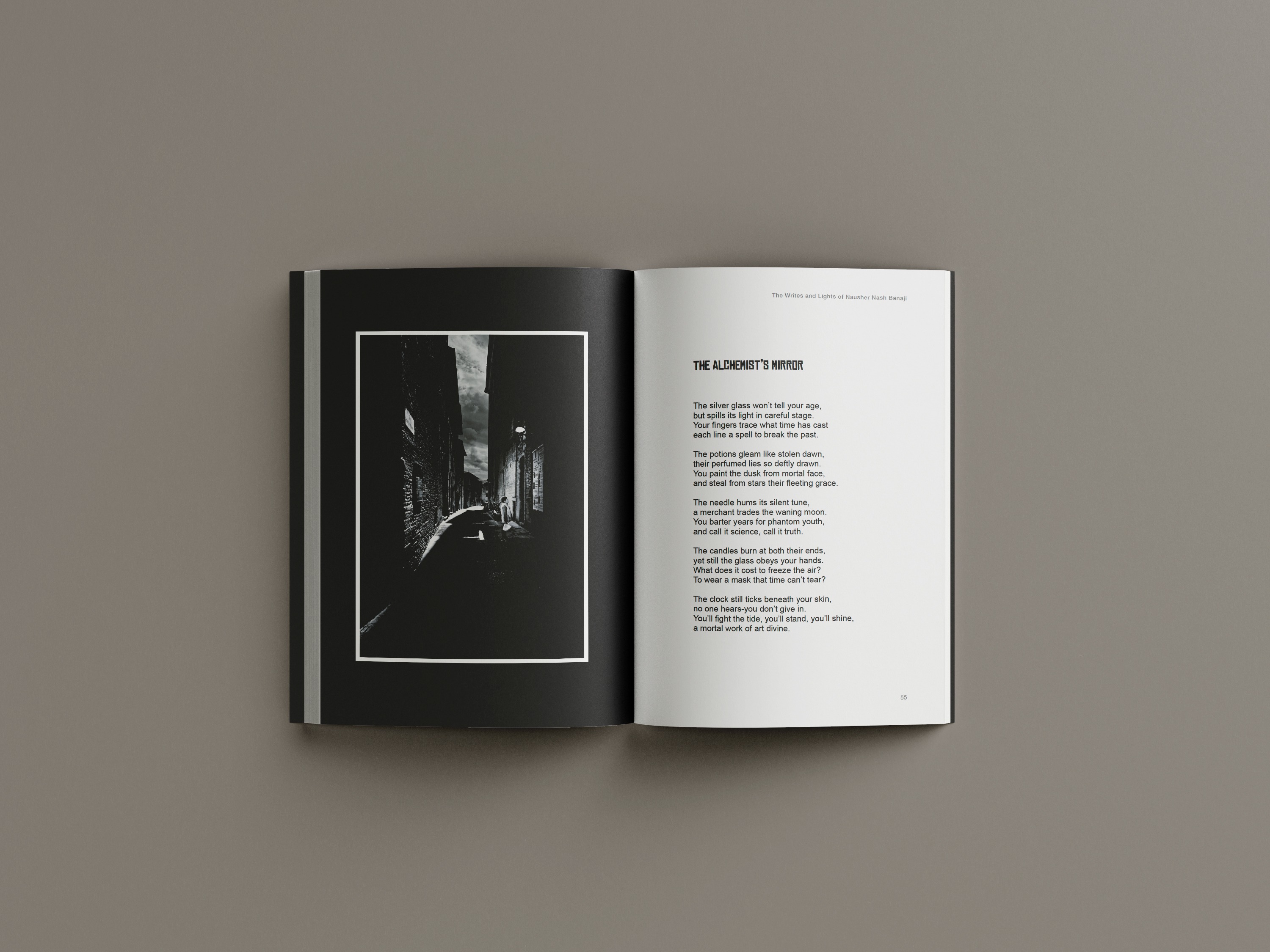 Interior spread with narrow alley photograph and poem on white page